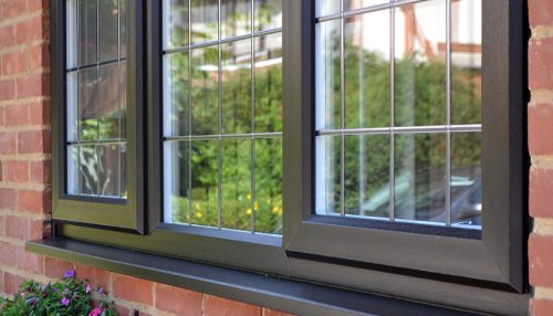 Close up of a black uPVC casement window installation