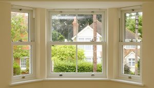 Interior view of white uPVC vertical sliding windows