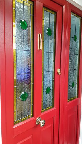 Red Edwardian entrance door with a side panel