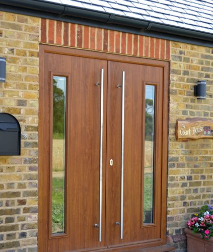 Brescia Double Solidor Composite Doors - Golden Oak