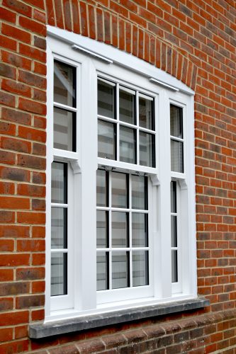 Vertical Sliding Window with Astragal Bar