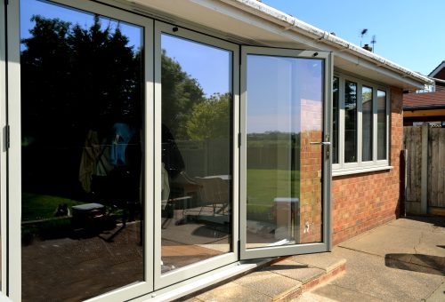 Bifold door colour matched to Sage