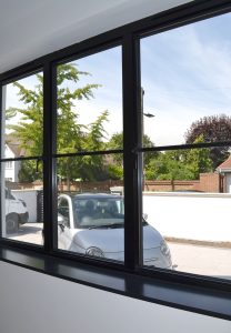 Aluminium window with astragal bar