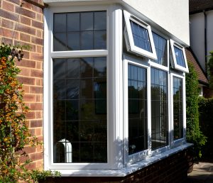White Bevelled Casement Windows with leadwork