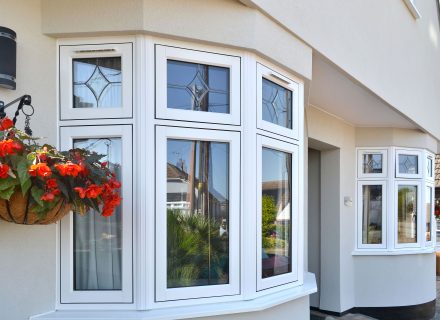 White flush window bay with bevelled glass